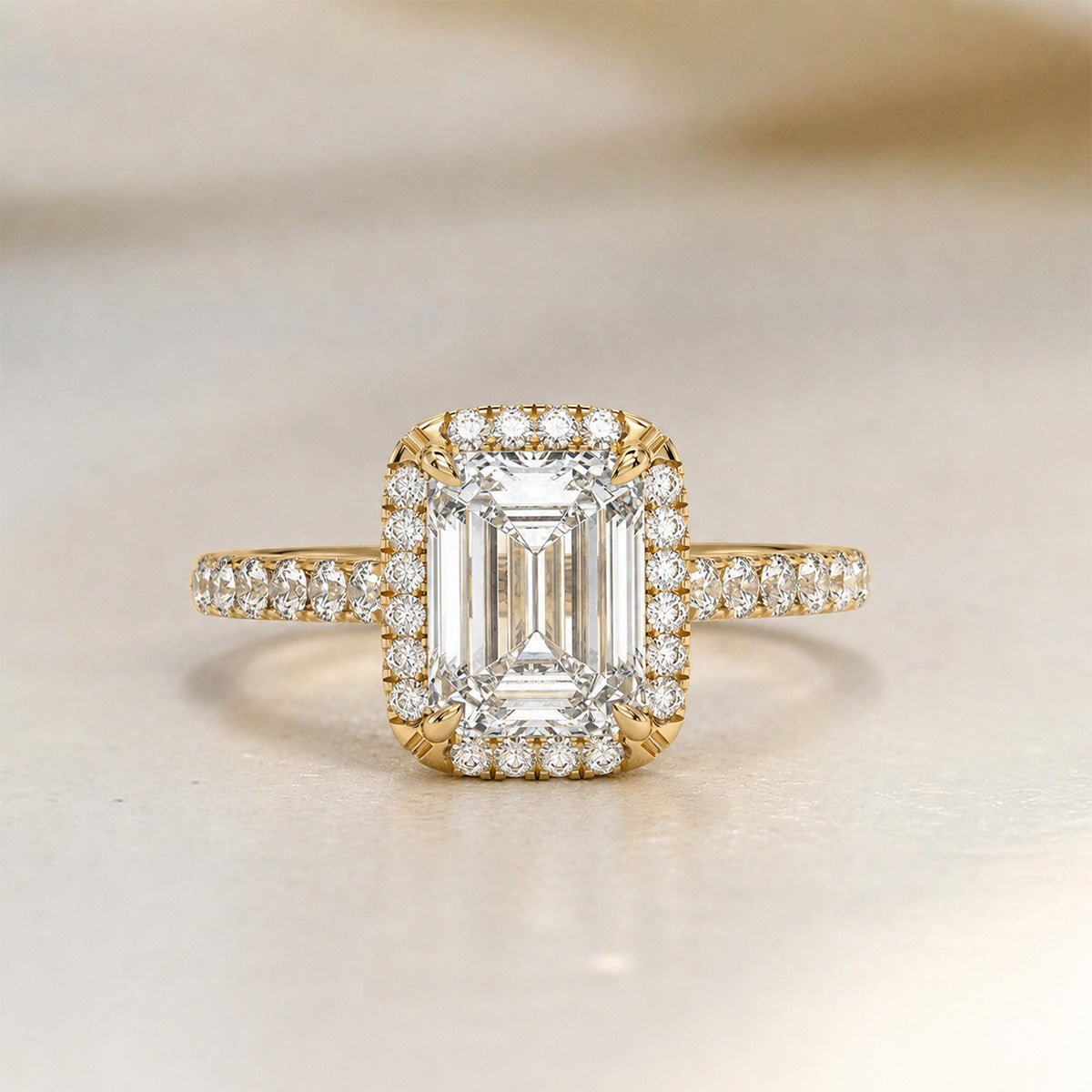 Emerald-cut halo engagement ring with pavé band, moissanite stones in 18K Yellow Gold Vermeil