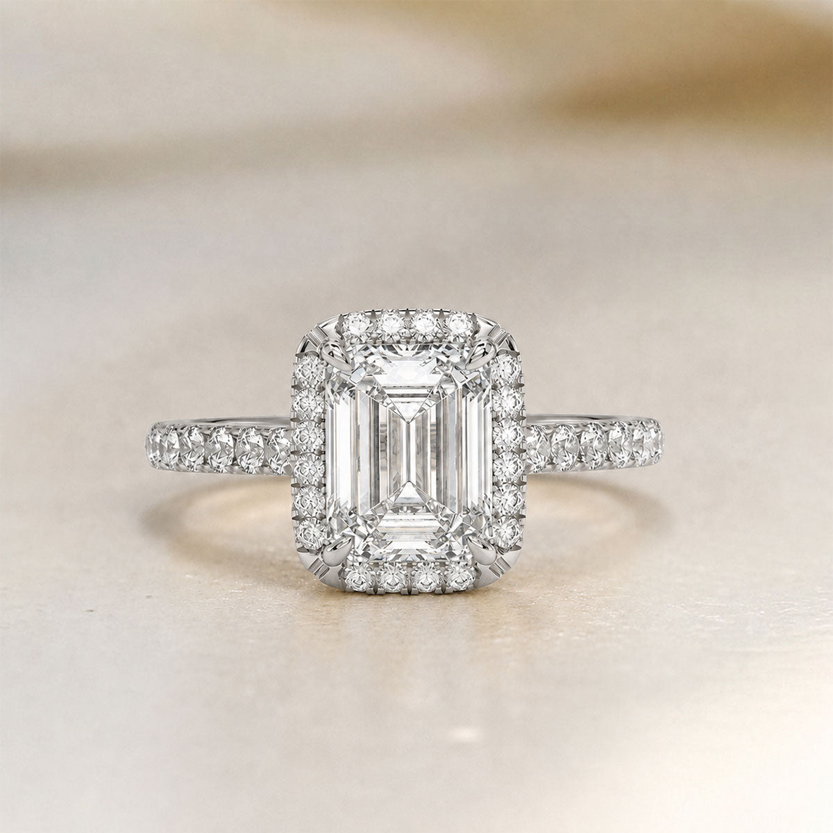 Emerald-cut halo engagement ring with pavé band, moissanite stones in 18K White Gold Vermeil