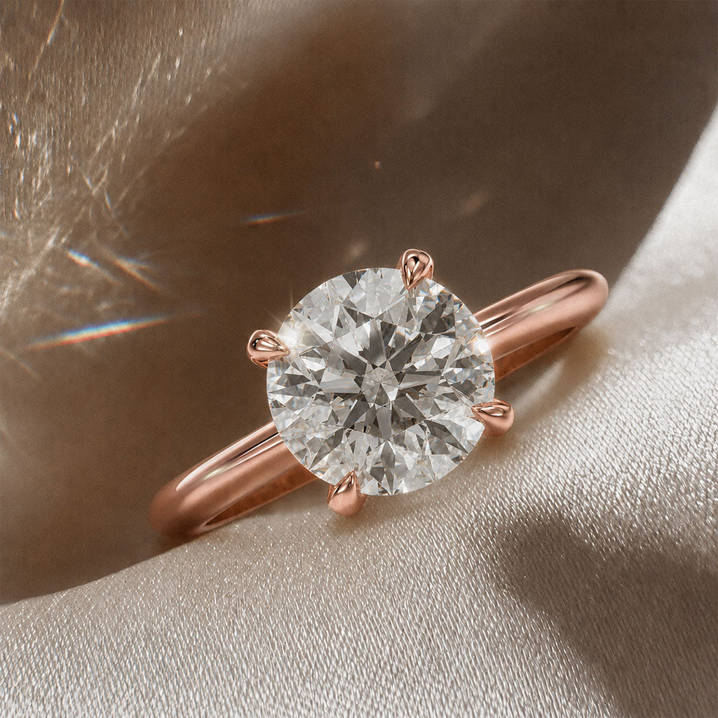 Four-prong round solitaire engagement ring, moissanite stone in 18K Rose Gold Vermeil