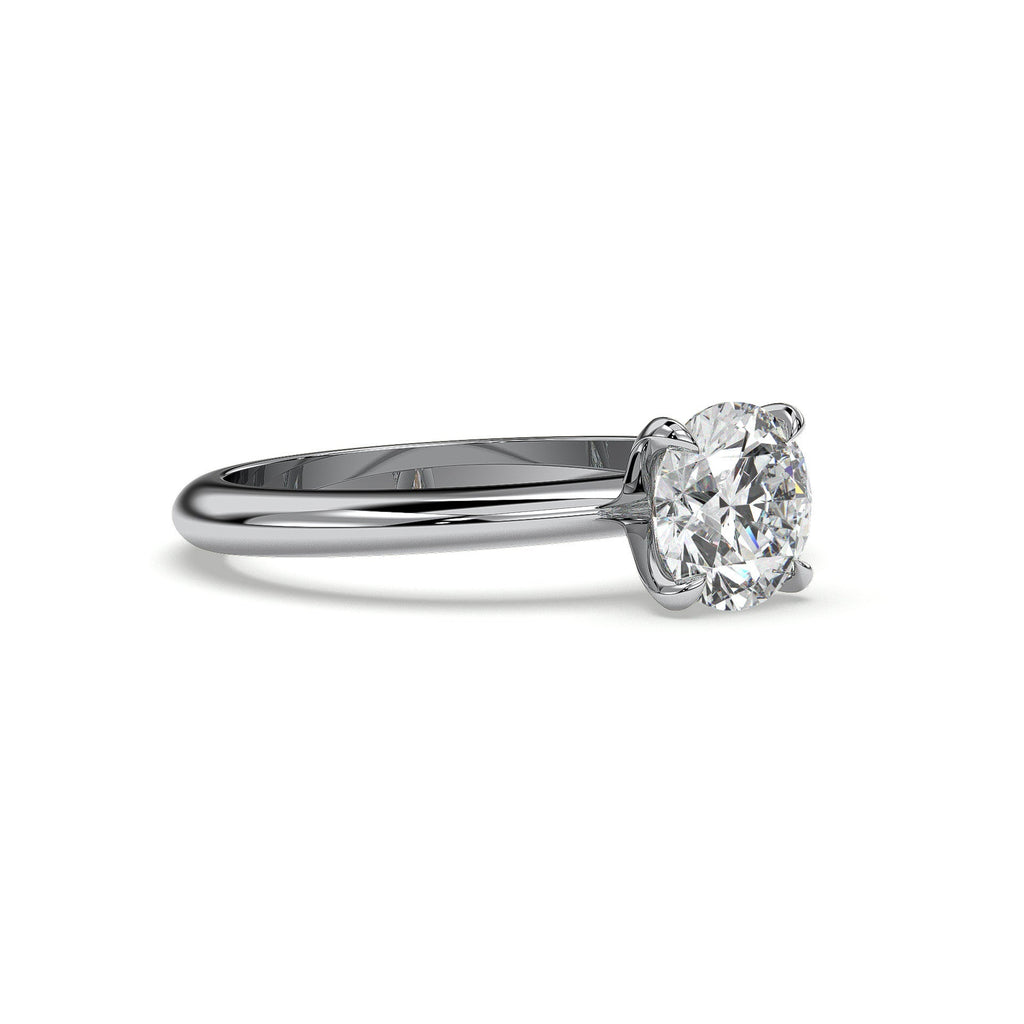 Four-prong round solitaire engagement ring, moissanite stone in 18K White Gold Vermeil