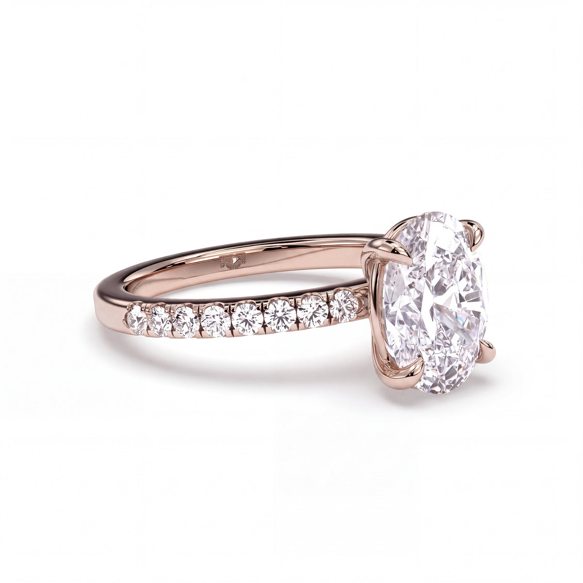 Oval hidden halo engagement ring with pavé band, moissanite stones in 18K Rose Gold Vermeil