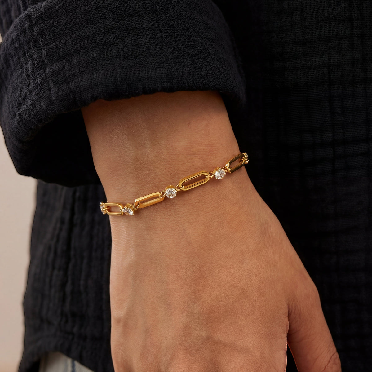 Paperclip chain bracelet with round stone stations, moissanite stones in 18K Yellow Gold Vermeil