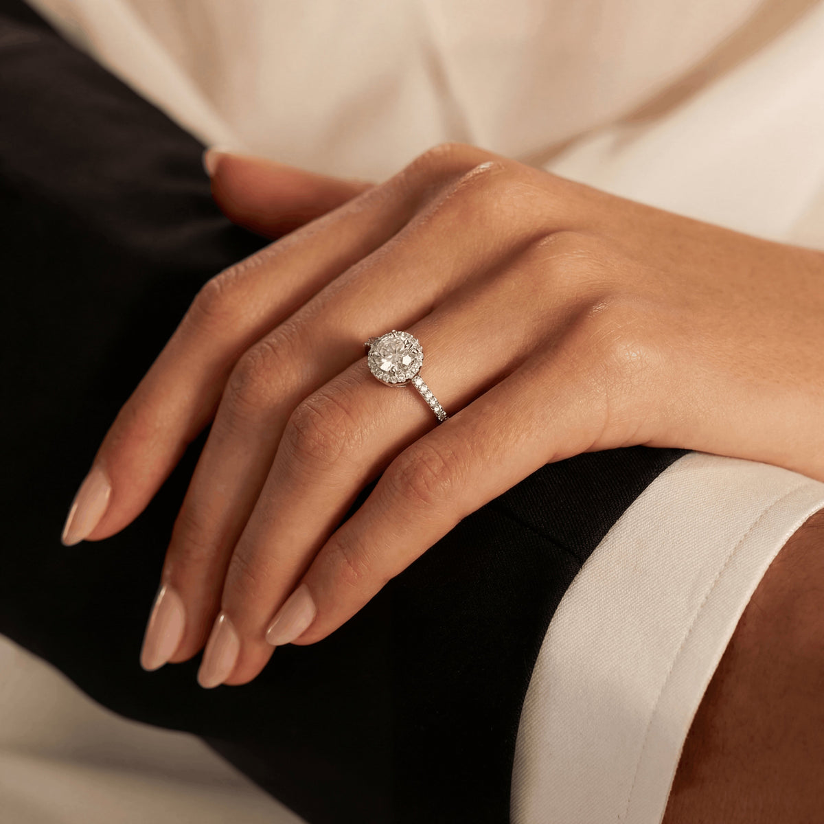 Round halo engagement ring with pavé band, moissanite stones in 18K White Gold Vermeil