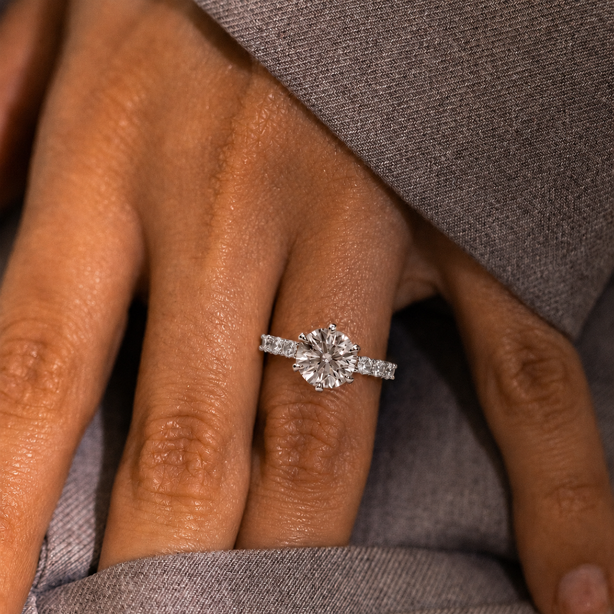 Round solitaire engagement ring with side stones, moissanite stones in 18K White Gold Vermeil