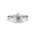 Six-prong round solitaire engagement ring, moissanite stone in 18K White Gold Vermeil