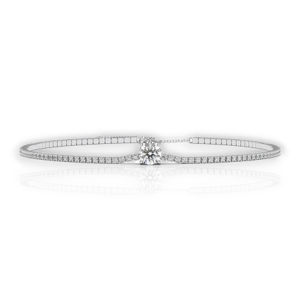 Slim tennis bracelet with round solitaire center, moissanite stones in 18K White Gold Vermeil