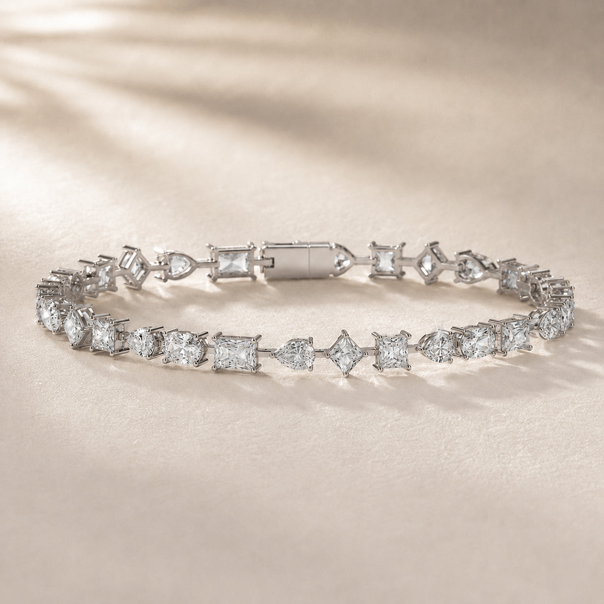 Moissanite tennis bracelet on ivory silk